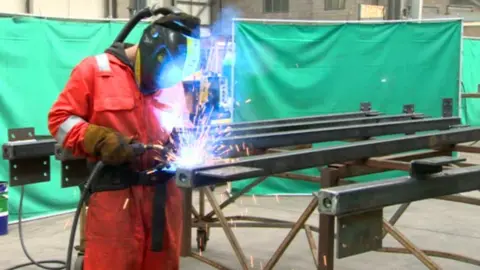 Worker welding