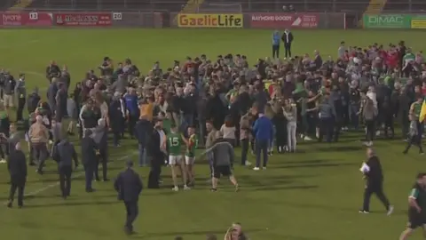 BBC Crowds came onto the pitch after Dungannon Clarkes won their first Tyrone Football title in 64 years