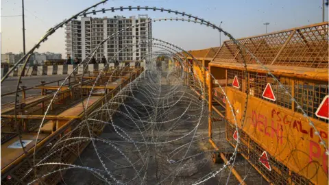 Getty Images Iron nails, rods, barbed wire, boulders and makeshift walls were used to barricade Delhi's borders against thousands of protesting farmers.