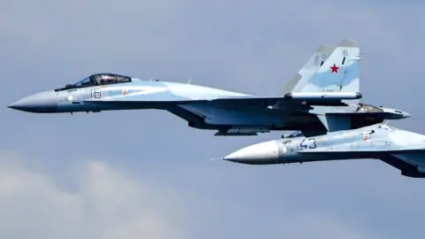 Getty Images Russian Sukhoi Su-35 and Su-30M2 fighter jets