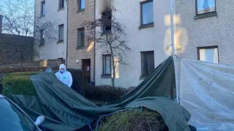 BBC Forensic officer at the scene