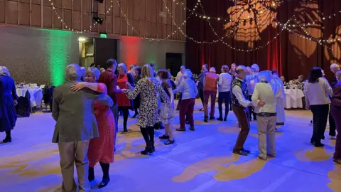 Jon Wright/BBC Participants of the tea dance