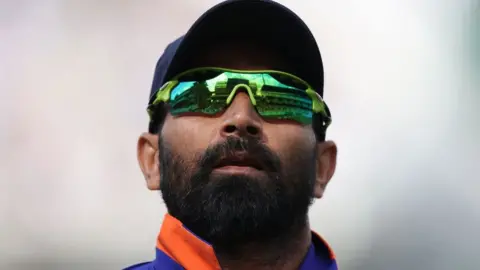 Getty Images India's Mohammed Shami reacts as he walks through the fielding positions during the Second Royal London One Day International (ODI) cricket match between England and India at the Lord's cricket ground in London on July 14, 2022.