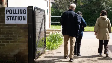 Voters arriving at a polling station