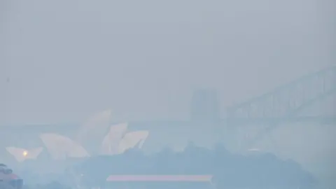 AFP The Sydney Opera House and Harbour Bridge are obscured by a smoky haze on November 1, 2019.