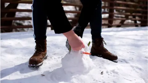 Mark Felix / AFP Snowman