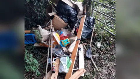 Wiltshire Council Furniture that has been fly-tipped in the woods