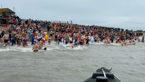 Gosport And Fareham Inshore Rescue Service Hundreds of people brave the cold for the New Year's Day dip at Gosport