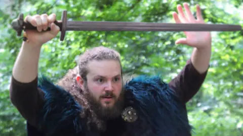 Blodlina Ed Tunningley with sword