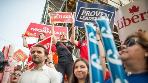 GEOFF ROBINS/AFP/Getty Images Canadian voters outside a debate before the 2015 federal election