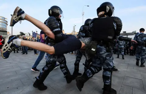 AFP Police and protesters in Moscow, 27 July