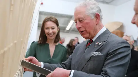 Getty Images Designer Lulu Lytle pictured with Prince Charles