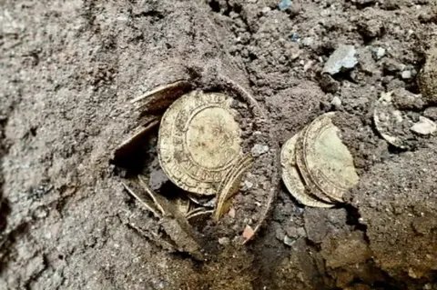 Spink & Son Coins in earth