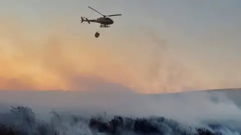 Helicopter waterbombing near Cannich