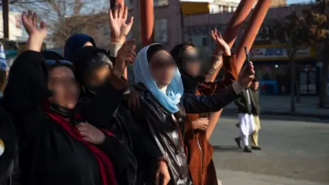 AFP Afghan women protest against new Taliban ban on women accessing University Education on 22 December in Kabul