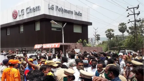 Getty Images Residents protest in front of LG Polymers plant demanding justice to the gas leak victims, in Visakhapatnam