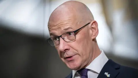 PA Media john swinney