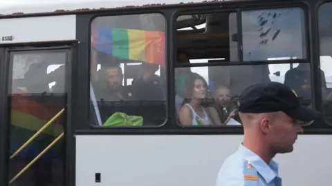 Reuters Demonstrators are seen in a police bus after being detained during the LGBT (lesbian, gay, bisexual, and transgender) community rally in central St. Petersburg, Russia August 4, 2018