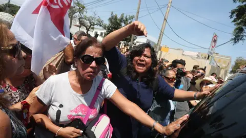 Getty Images Apra supporters in Lima