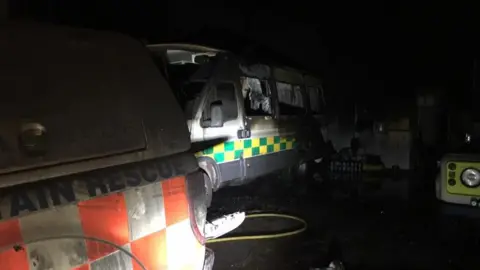 Central Beacons Mountain Rescue Team The team's three vehicles were damaged in the fire