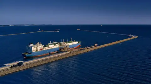 LNG transportation vessel Maran Gas Appolonia while discharging at terminal for liquified gas, connections, Swinoujscie, Poland, 15 May 2022