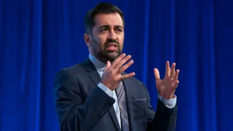 PA Media Humza Yousaf