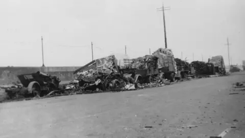 J C Allain/Simon Hamon Tomato trucks hit by the bombs