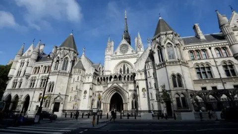 PA Media The high court in London