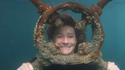 Allie Dart Allie swimming underwater