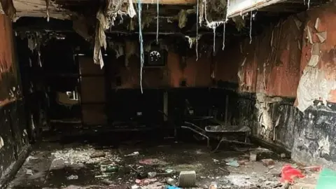 BBC The derelict interior of TJ's club