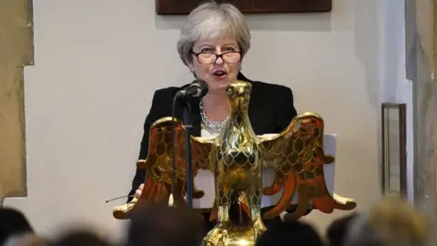 PA Media Former prime minister Theresa May delivered a reading at the funeral.