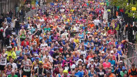 PA Media runners during the London Marathon in 2023