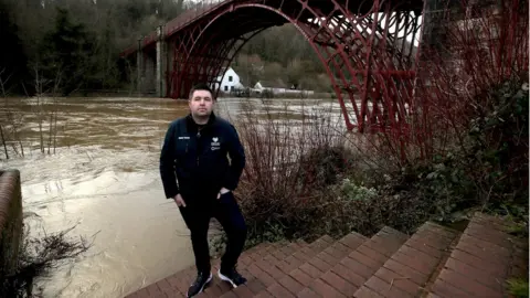 PA Media Telford & Wrekin Councillor Shaun Davies near the River Severn in Ironbridge