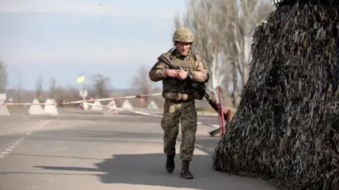 Getty Images Ukrainian soldier on patrol