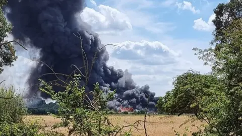 Plumes of smoke from the fire at Weeting, near Brandon