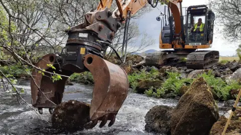 Natural Rescources Wales Work to put boulders back into rivers to create better habitat for mussels