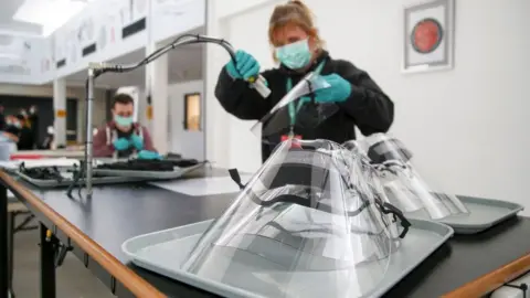 Getty Images Woman making plastic face mask