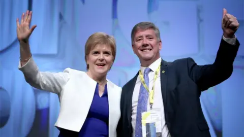 PA Nicola Sturgeon and Keith Brown
