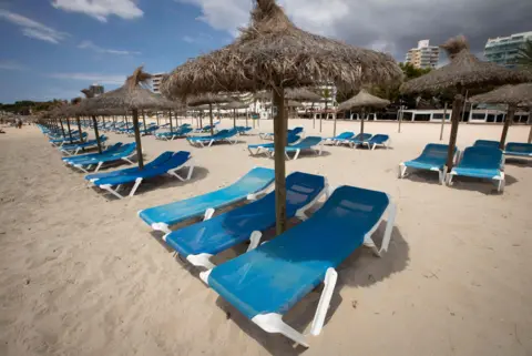 AFP Empty beach chairs in Majorca