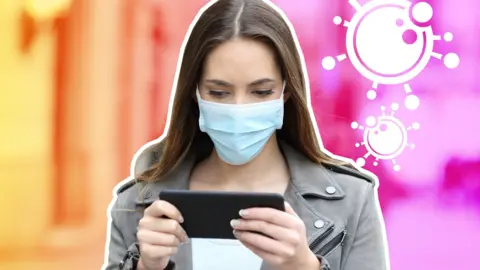 Getty Images A woman on a smartphone