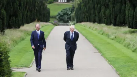 Getty Images Boris Johnson with Taoiseach Michael Martin at Hillsborough Castle in Belfast