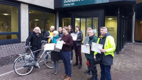 Cyclox Handing in petition