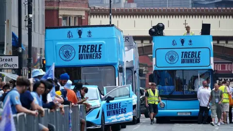 PA Media Open-top double decker buses for Manchester City parade