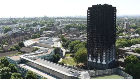 PA An aerial shot of the charred remains of the Grenfell tower block.