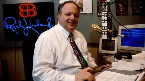 Getty Images Rush Limbaugh presenting his radio show in 1995