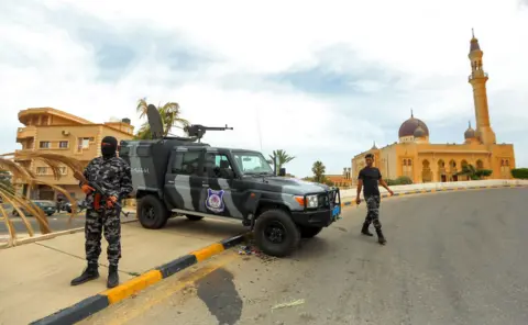 AFP Forces loyal to the GNA man a checkpoint in Tarhuna after the takeover in June 2020