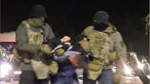 Telegram/SBU Footage shows a man being arrested