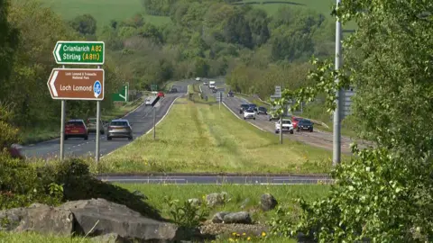 Man dies after car hits five workers on A82 road at Dumbarton