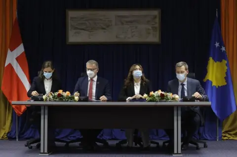 EPA Kosovo Minister of Economy Artane Rizvanolli, Danish Minister for Development Co-operation Flemming Moller Mortensen, Kosovo Justice Minister Albulena Haxhiu, and Danish Justice Minister Nick Haekkerup sign a letter of intent, in Pristina, Kosovo, on 20 December 2021