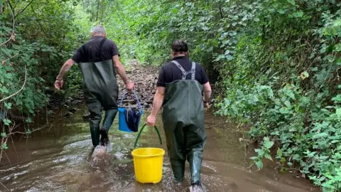 Environment Agency Staff on the River Dore